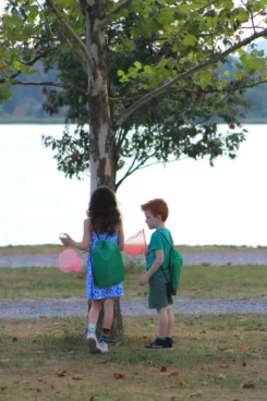 Kids using Jr. Naturalist toolkits at Bald Eagle State Park